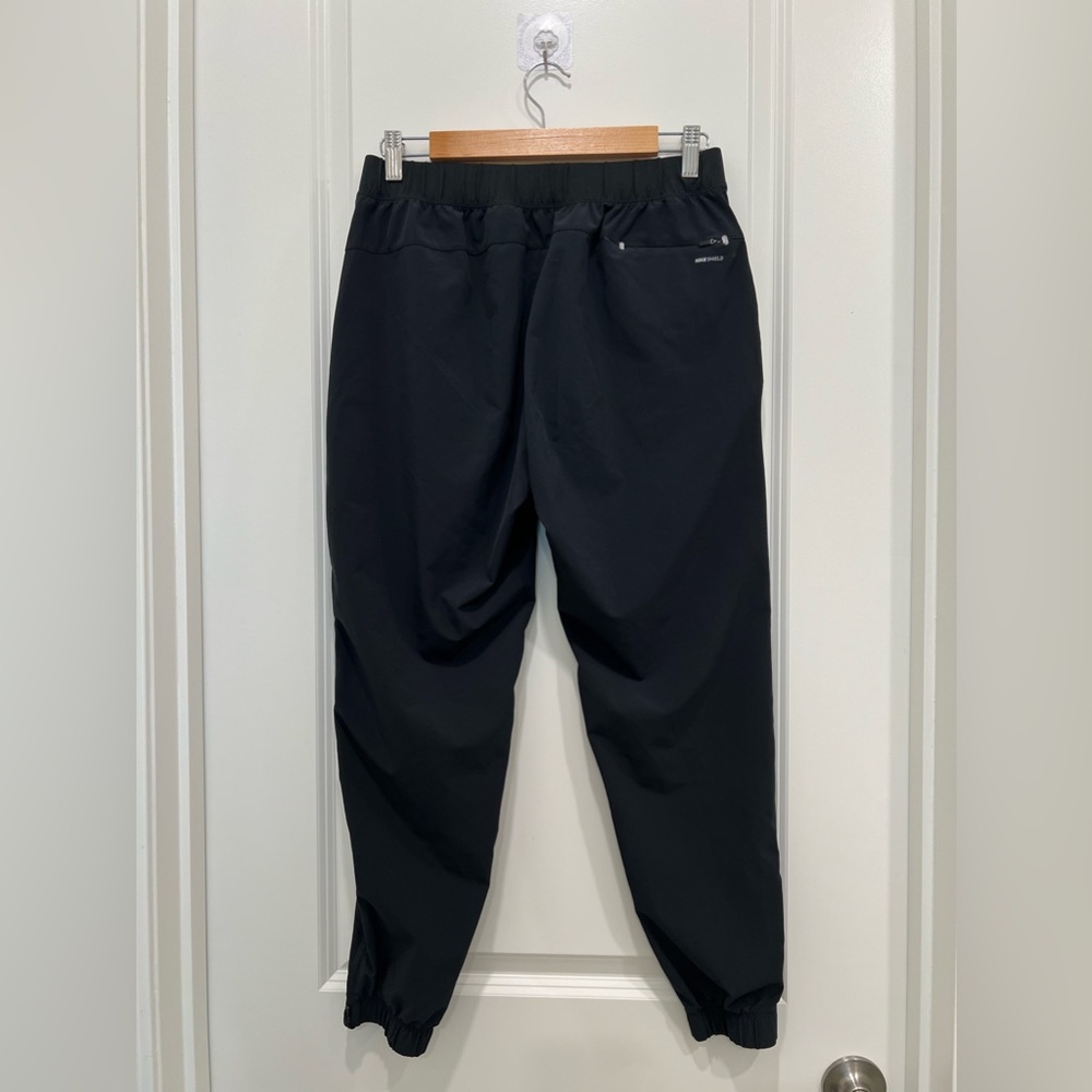 NIKE Women’s Shield Swift Running Pants - Picture 5 of 10